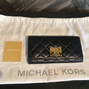 Michael Kors gold and black quilted wallet